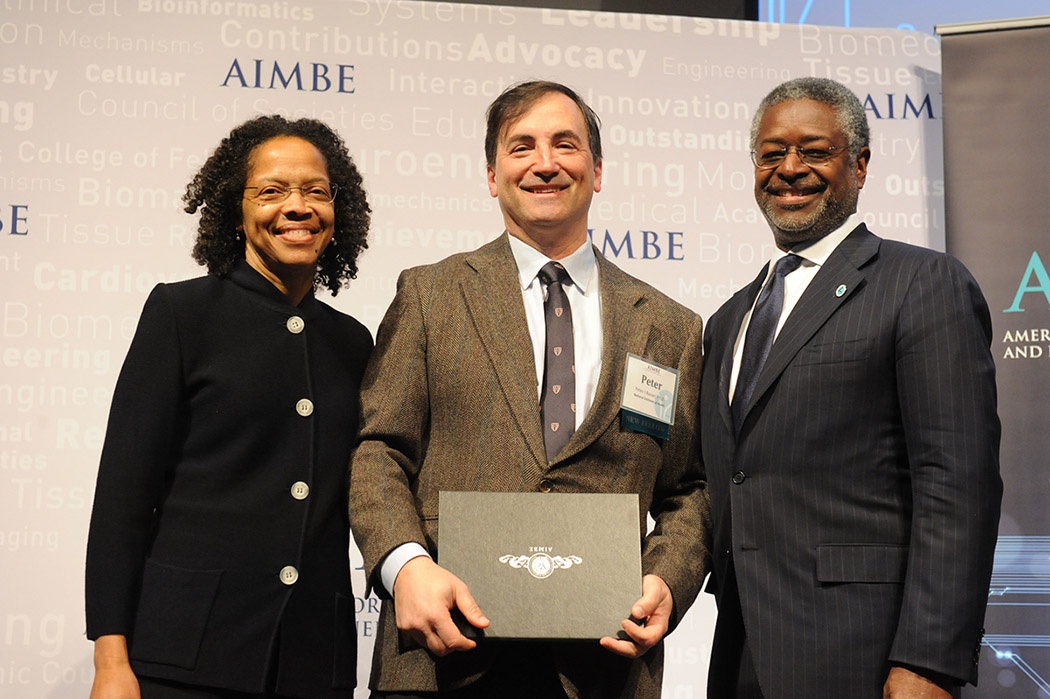 Dr. Basser accepting his AIMBE award.