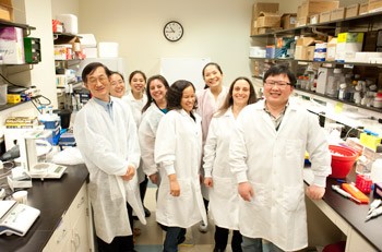 The team, happy in the lab