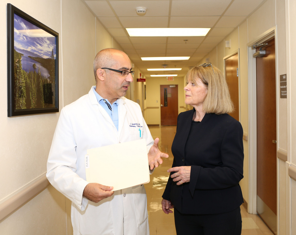 Janet Hall (right) talking with Stavros Garantziotis