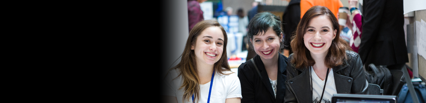 Three women smiling