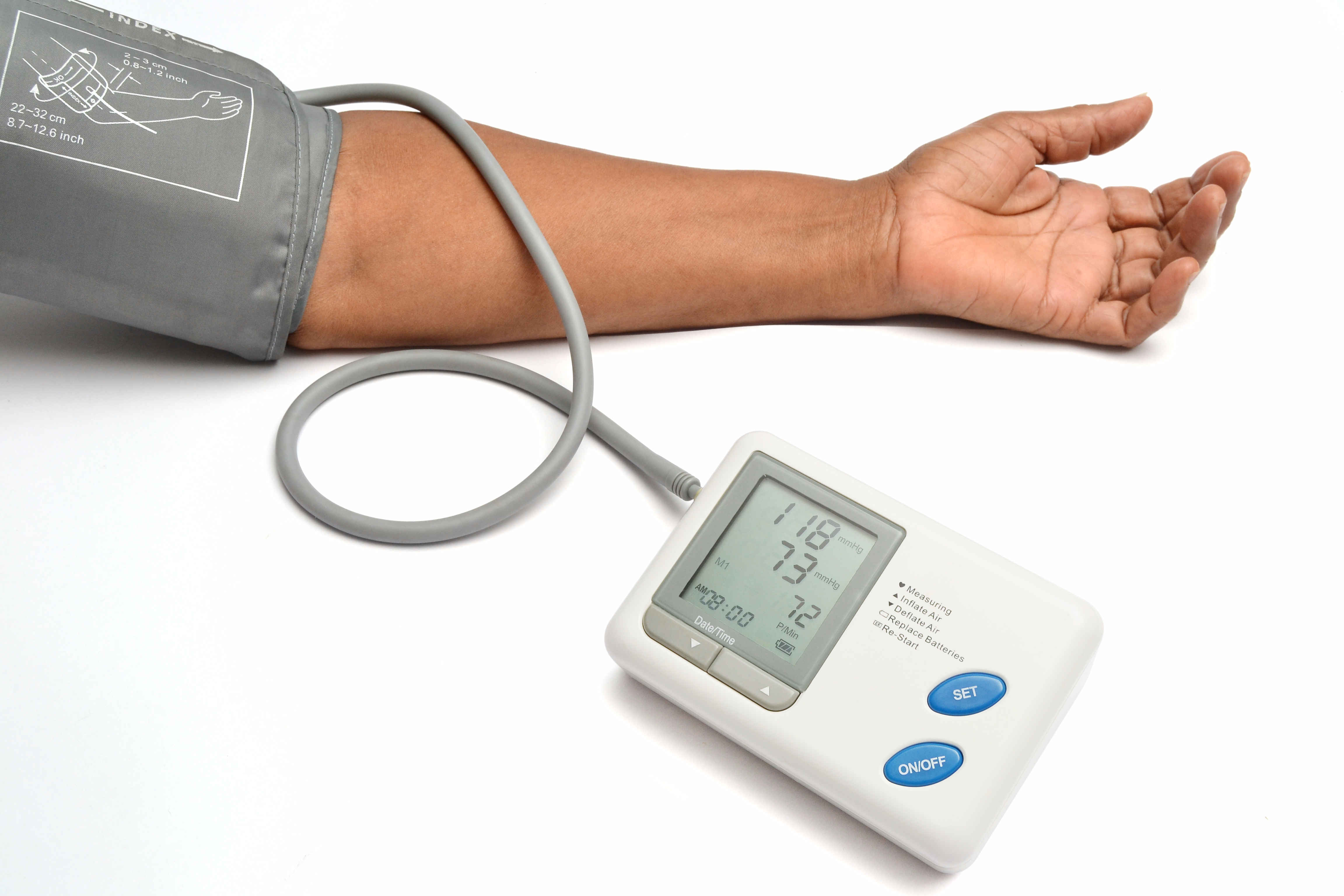 Photo of blood pressure monitor on a person's arm