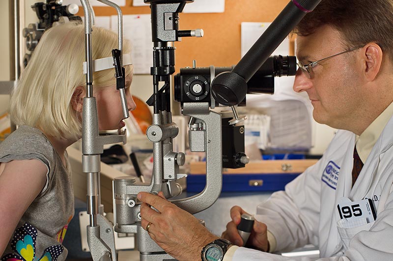 Dr. Brooks examines Lotus’ eyes