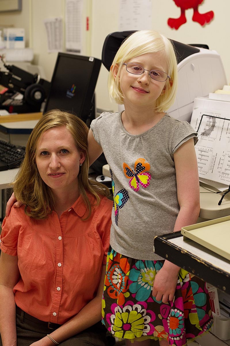 Lotus and her mother Kerry (left) visit Dr. Brooks’ clinic