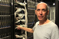 Staff scientist Steven Fellini, Ph.D., manages the Biowulf cluster, a supercomputer used to process massive amounts of experimental genomic data