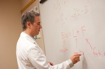 Kevin Hall, Ph.D., designs mathematical tools that help overweight people shed pounds and keep them off