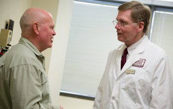 Dr. Linehan meets with Roger, a patient with BHD, to discuss the treatment plan.