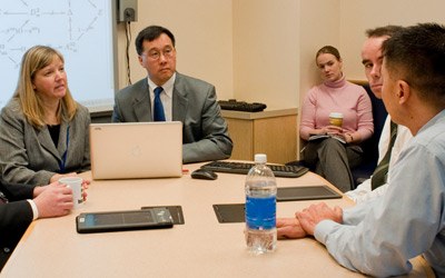 Rasch and colleagues discuss findings from the SSA Compassionate Allowances project. (From l to r: Elizabeth Rasch, Leighton Chan, Meghan Gleason, John Collins, Minh Huynh)