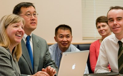 Rasch and colleagues at a bi-monthly team meeting. (From l to r: Elizabeth Rasch, Leighton Chan, Minh Huynh, Diane Brandt, John Collins)