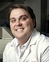 Erik J. Tokar
